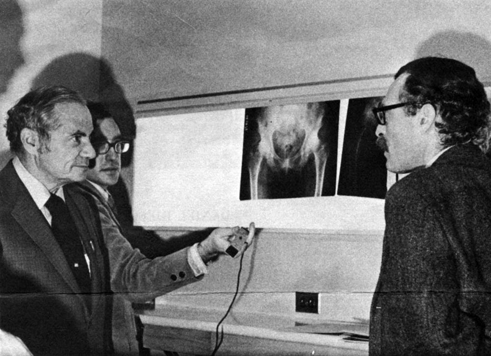Dr. Bertram Bensam (left) explains the total hip operations being performed at Robert Packer Hospital to Pennsylvania governor Milton Shapp during a visit in 1972.