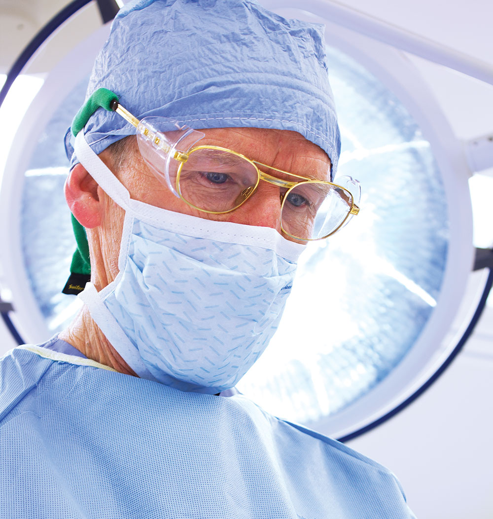 Chief Dr. Bill Ward in the OR, 2013.
