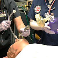 students practicing respiratory therapy techniques 