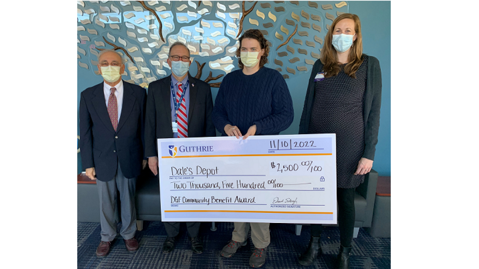 Dr. Charles Fedele, Member of the Donald Guthrie Foundation Community Benefit Committee, Dr. Edmund Sabanegh, Guthrie President and CEO, Julie Kerrick, Director and Founder of Dale's Depot, and Carly Nichols, Program Manager, Community and Hospital Based Projects