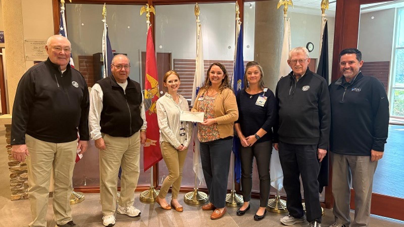Representatives from the Josh Palmer Fund presented caregivers from the Guthrie Corning Cancer Center with a $23,500 donation.