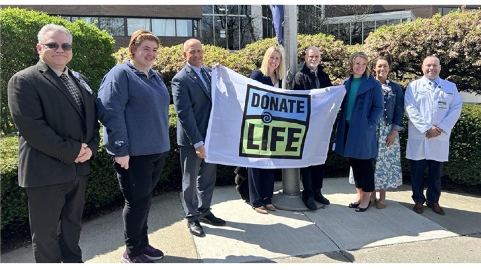Left to right: William Osterman, Vice President, Nursing, Robert Packer Hospital; Kyra Snook, Spouse of a Donor; Joseph Sawyer, President, Guthrie Robert Packer Hospital; Christie Ryan, Director of Professional Services and Hospital Development, CORE; David Webster, Heart Recipient; Shannon Clark, Living Donor; Vanessa Kabes, RN, Robert Packer Hospital CORE Advisory Council; Dr. Adam Breslin, ICU Medical Director and Organ Donor Support Team Provider at Guthrie.