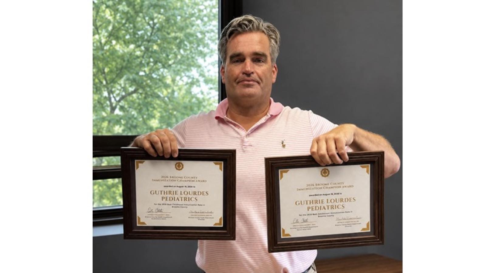 Pediatrician Sean Holdridge, MD, with the 2026 Broome County Immunization Champion Awards for Guthrie Lourdes Pediatrics.