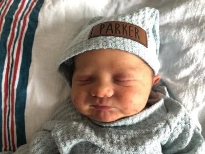 Parker on hat