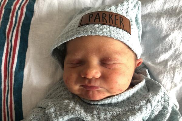 Parker on hat