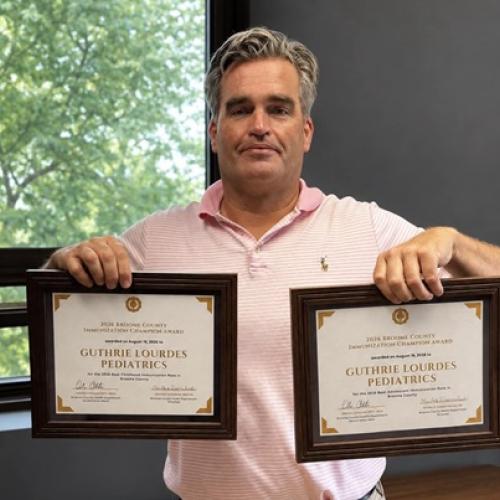 Pediatrician Sean Holdridge, MD, with the 2026 Broome County Immunization Champion Awards for Guthrie Lourdes Pediatrics.